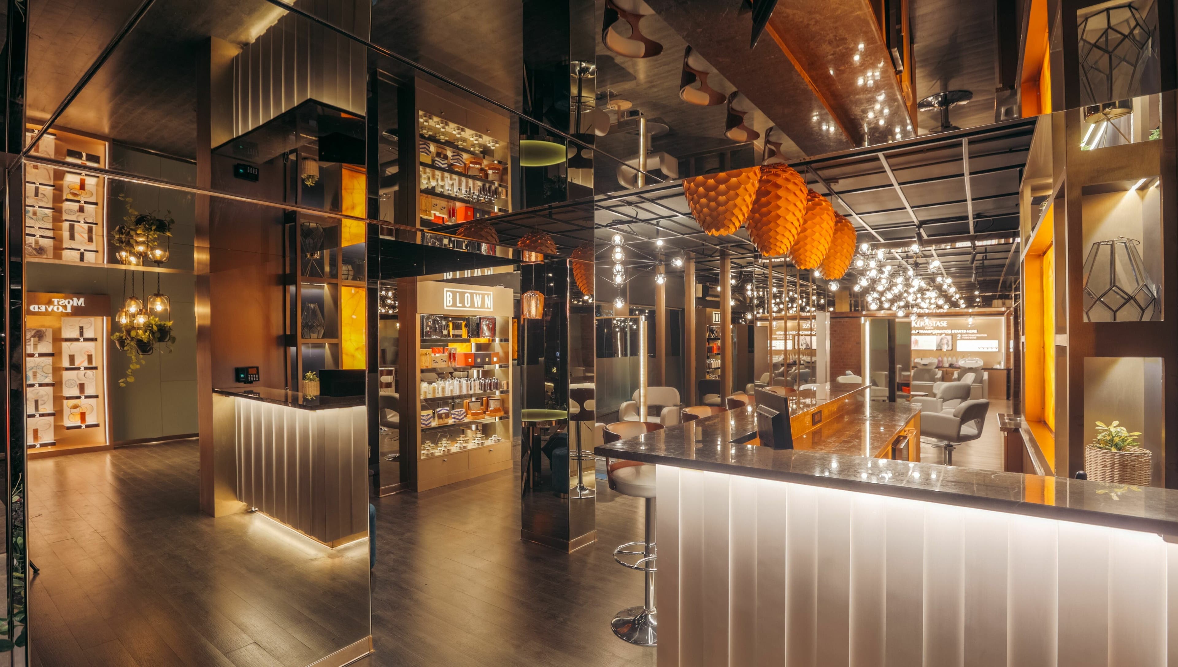 Elegant interior of Blown - Salon - Indiranagar in Bangalore, Karnataka, IN with stylish lighting and decor.