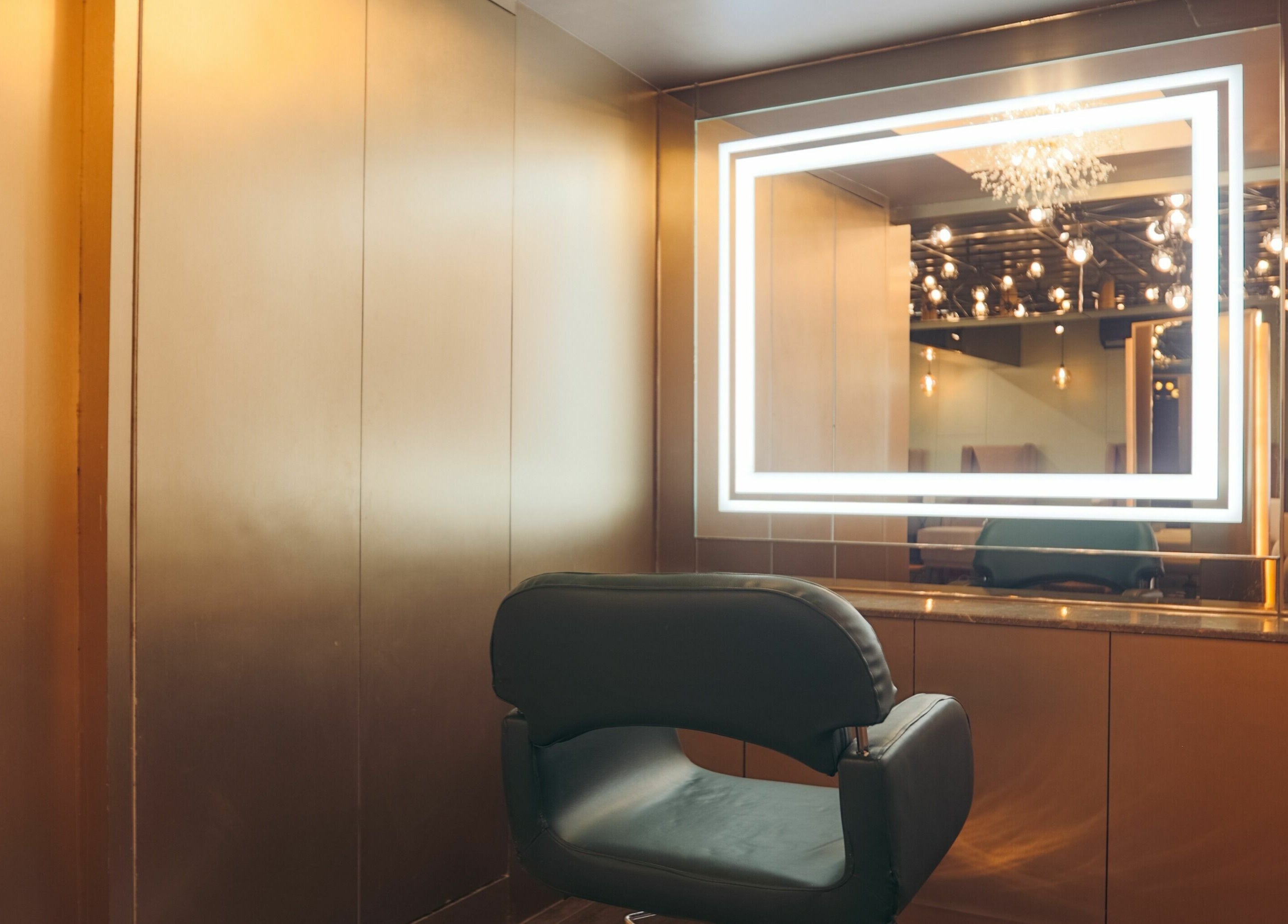 Luxurious salon chair and illuminated mirror at Blown - Salon - Indiranagar, Bangalore, Karnataka, IN.