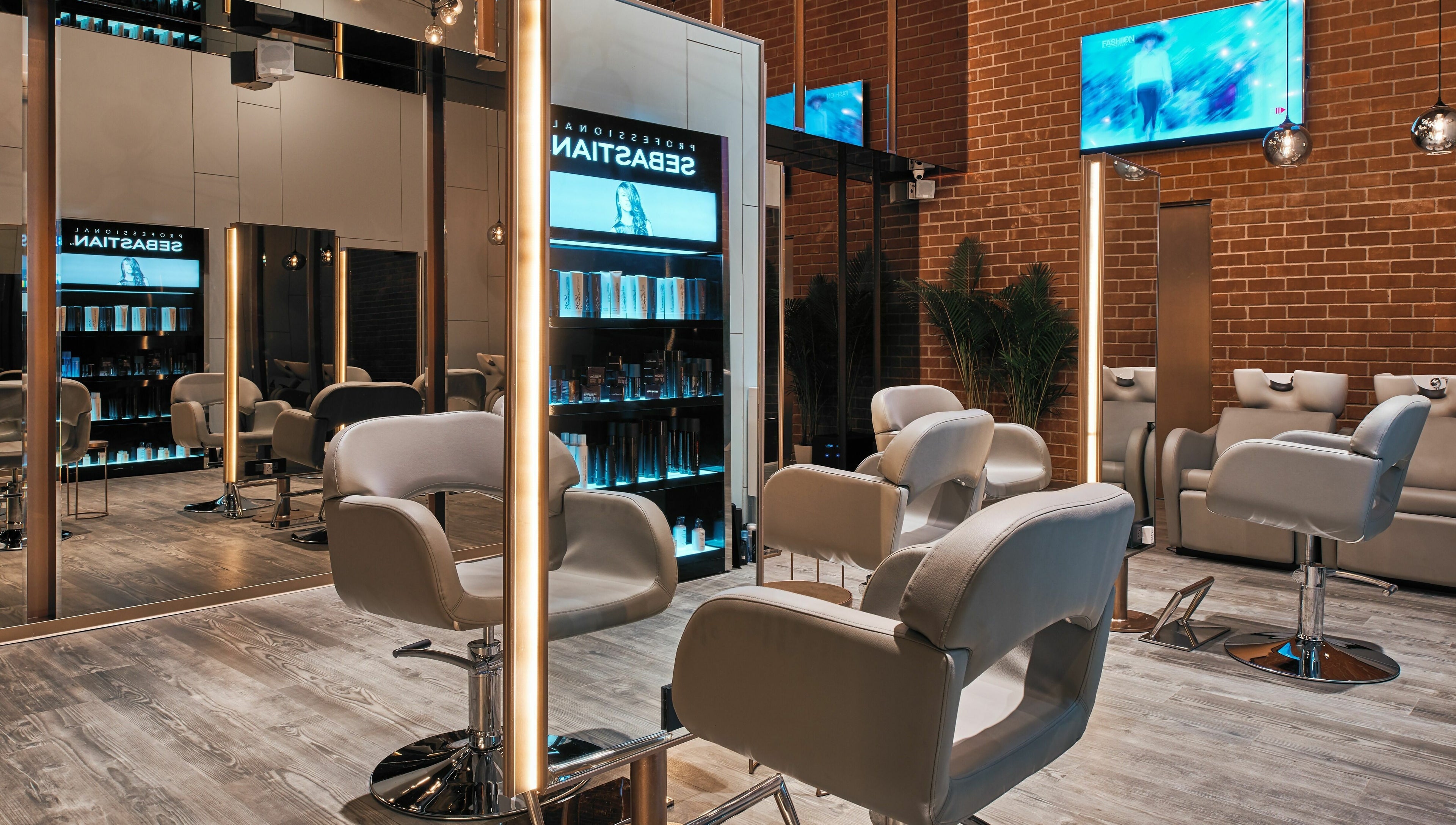 Modern salon interior with styling chairs at Blown - Salon - Vittal Mallya Road, Bangalore, Karnataka, IN.