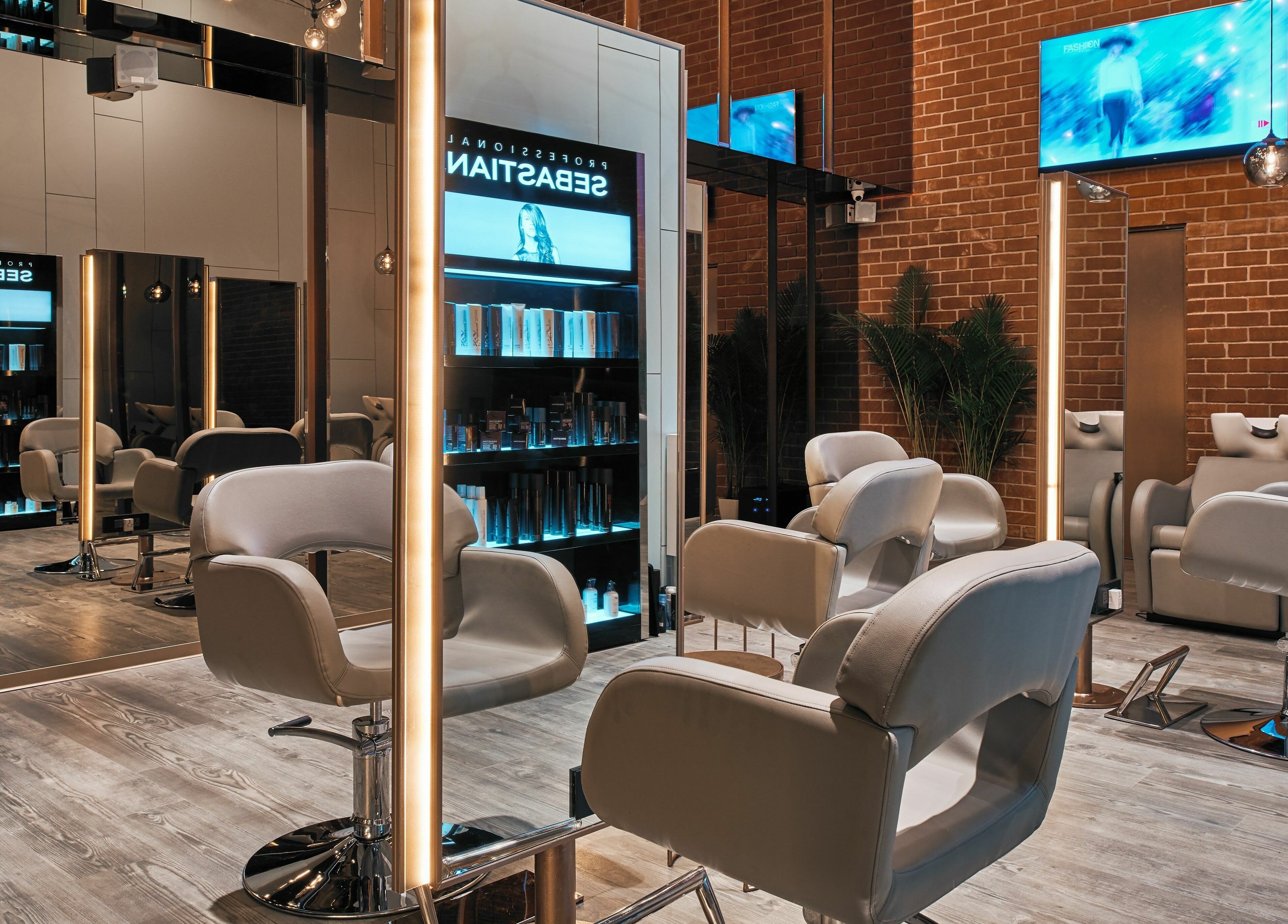 Modern salon interior with styling chairs at Blown - Salon - Vittal Mallya Road, Bangalore, Karnataka, IN.