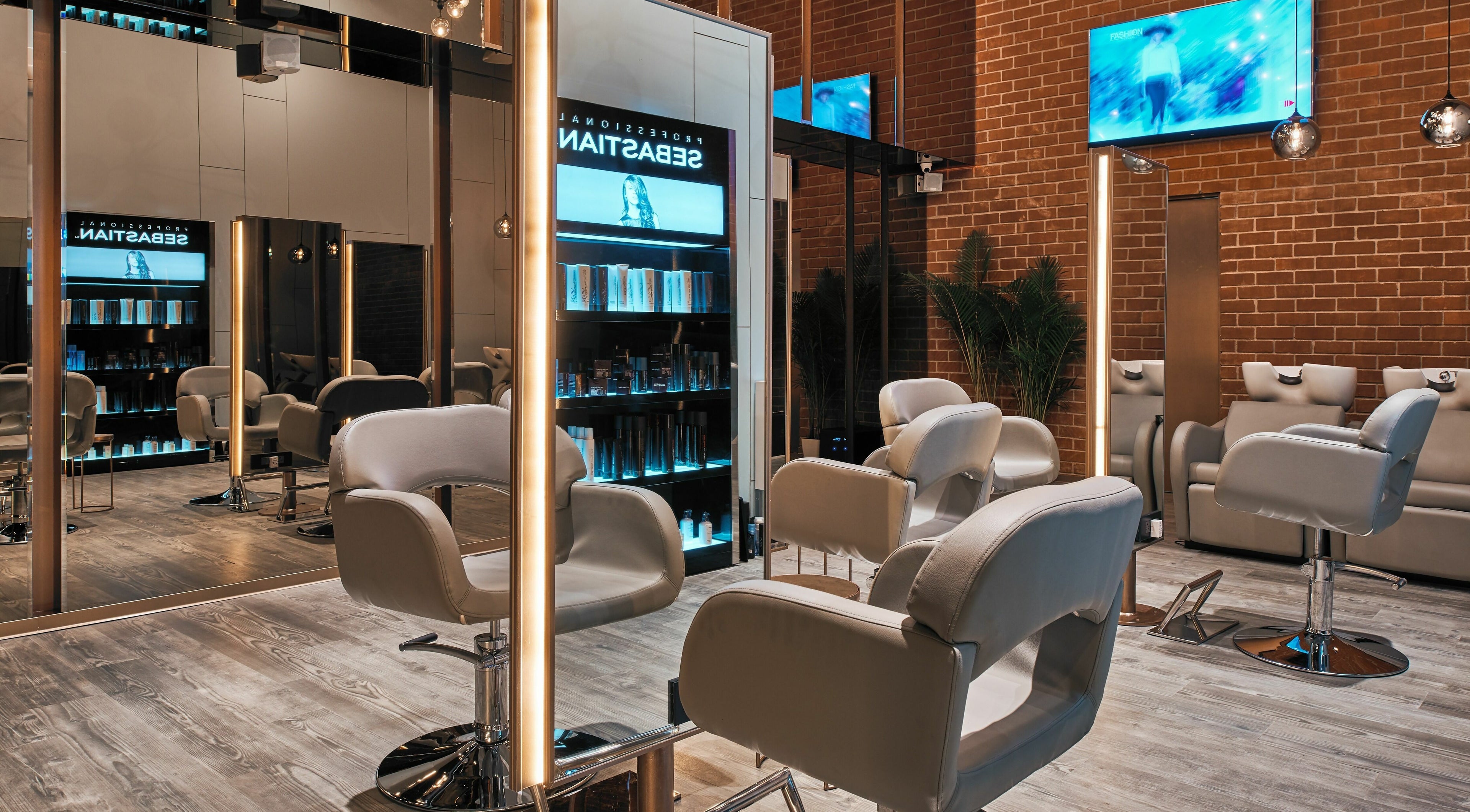 Modern salon interior with styling chairs at Blown - Salon - Vittal Mallya Road, Bangalore, Karnataka, IN.