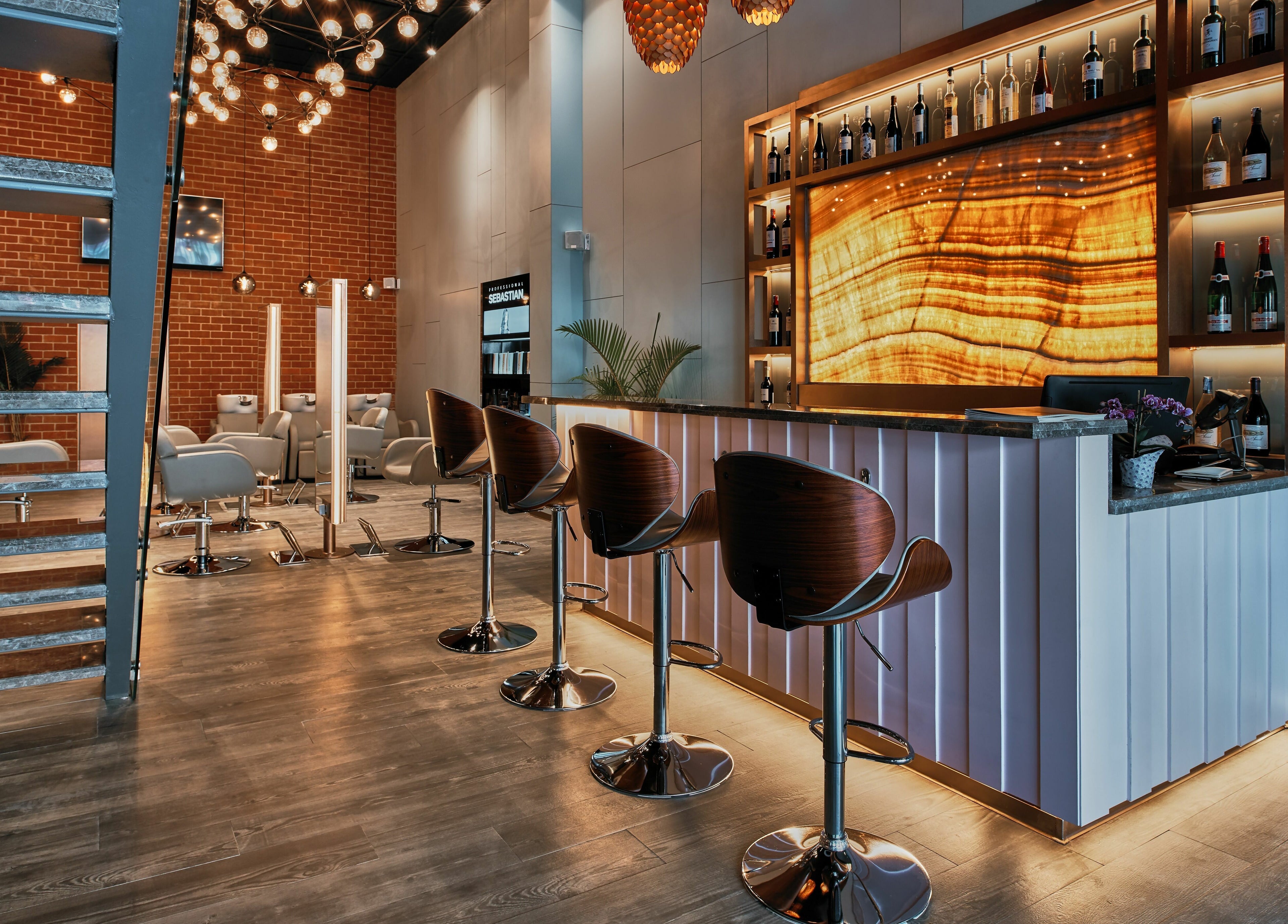 Chic interior of Blown - Salon - Vittal Mallya Road, Bangalore, Karnataka, IN with stylish chairs and lighting.
