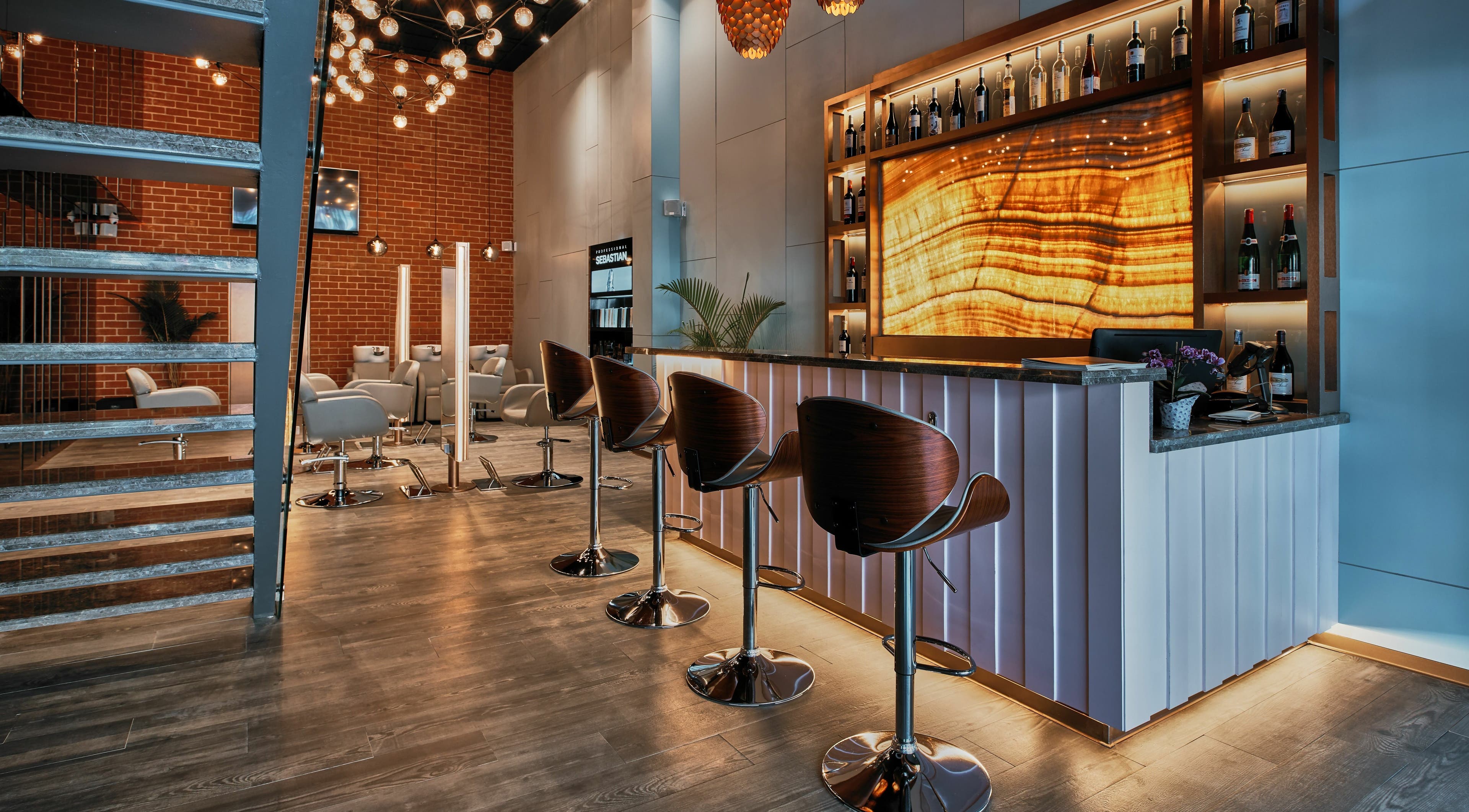 Chic interior of Blown - Salon - Vittal Mallya Road, Bangalore, Karnataka, IN with stylish chairs and lighting.
