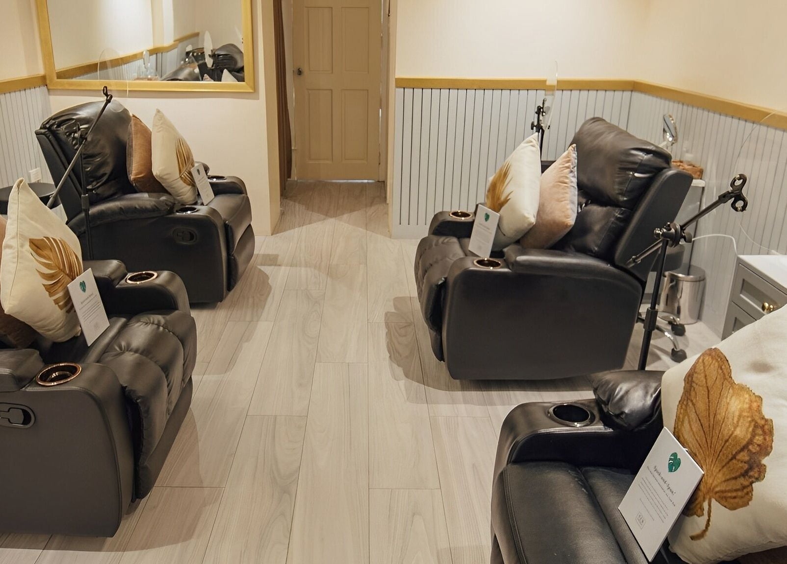 Relaxing massage chairs at NEW Lounge Glorietta in Makati, Metro Manila, PH, offering a luxurious wellness experience.