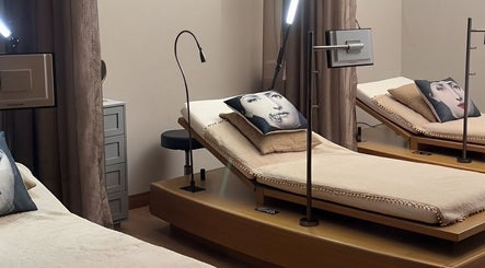 Relaxing massage room at NEW Lounge Boracay, Aklan, PH, featuring elegant decor and calming ambiance.