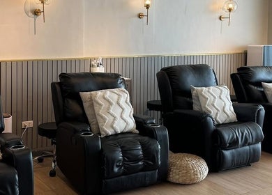 Cozy recliners at NEW Lounge Boracay, Aklan, PH, offering a serene relaxation spot.