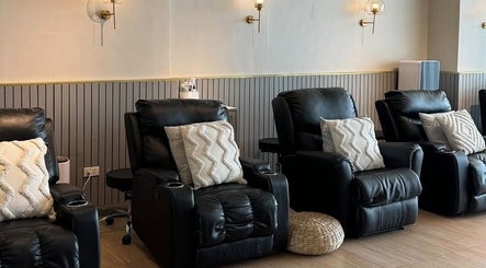 Cozy recliners at NEW Lounge Boracay, Aklan, PH, offering a serene relaxation spot.