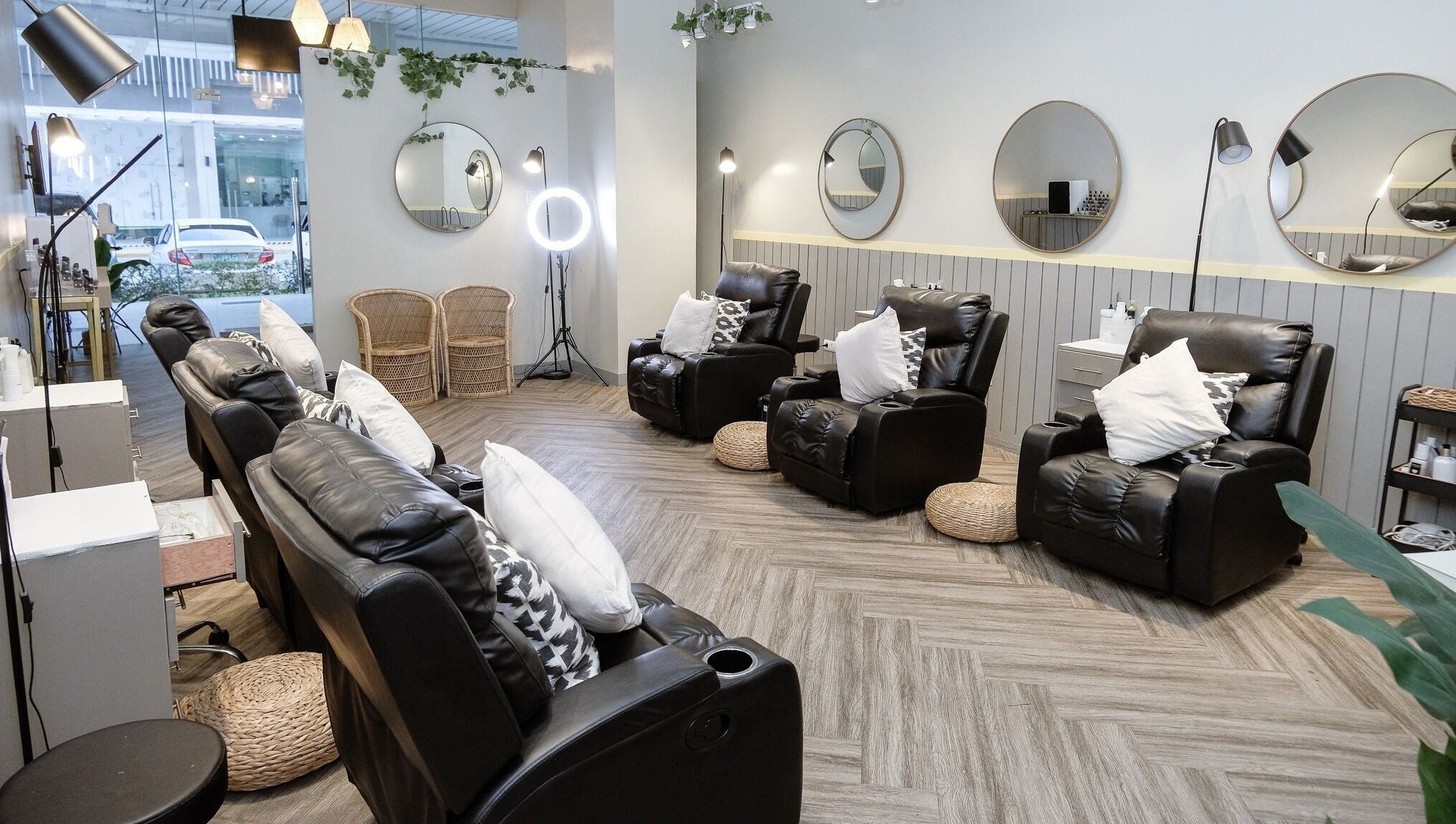 Relaxing interior of NEW Lounge Cebu in Cebu, PH with plush seating and elegant mirrors.