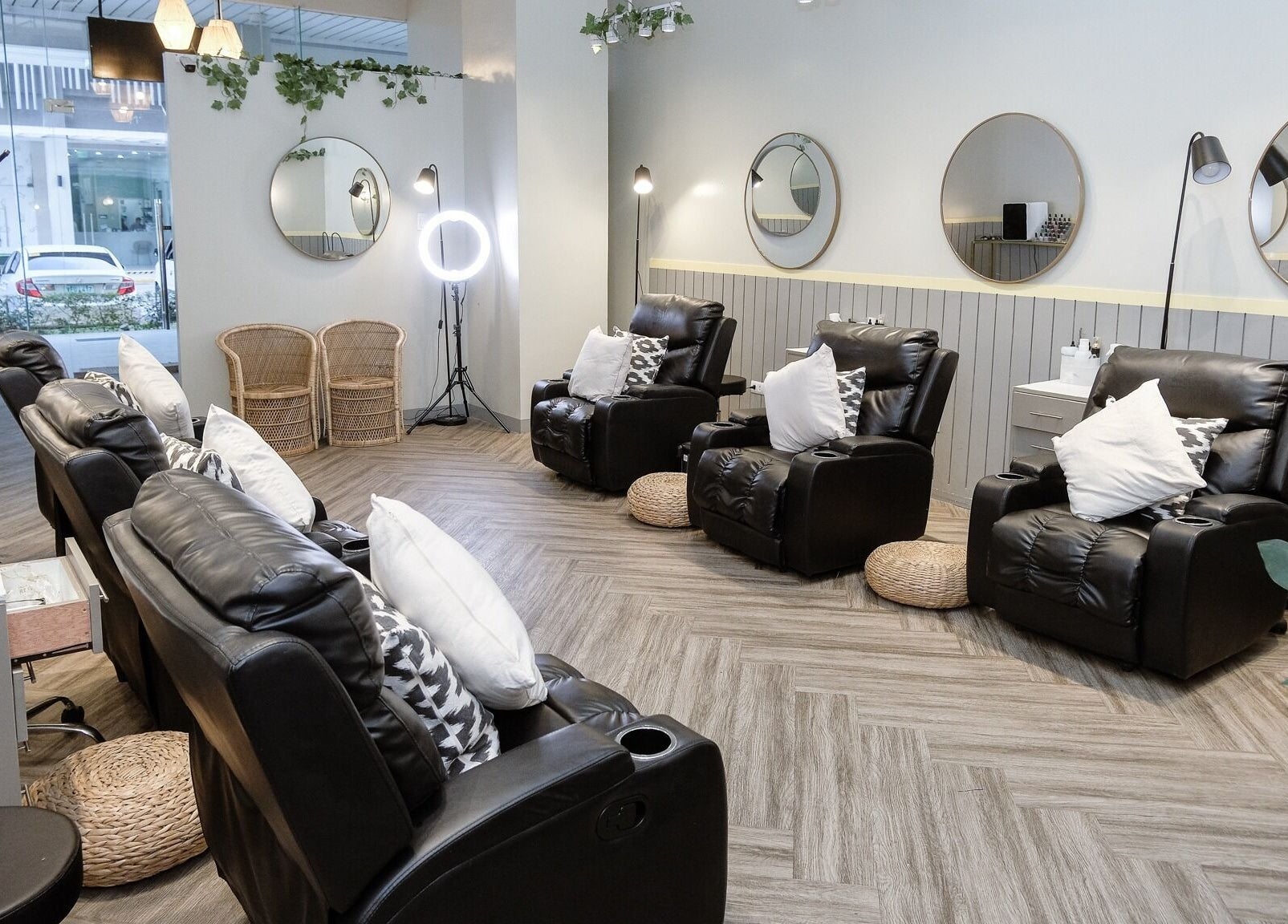 Relaxing interior of NEW Lounge Cebu in Cebu, PH with plush seating and elegant mirrors.