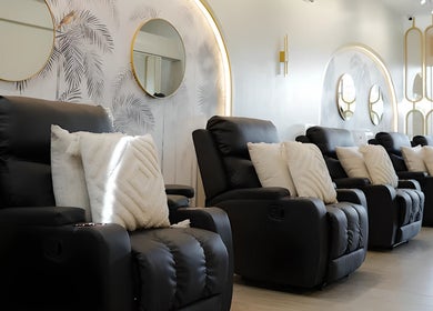 Elegant seating at NEW Lounge Sta Rosa, Santa Rosa, Calabarzon, PH with plush recliners and stylish decor.
