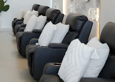 Comfortable black recliners with cushions at NEW Lounge Sta Rosa, Santa Rosa, Calabarzon, PH.