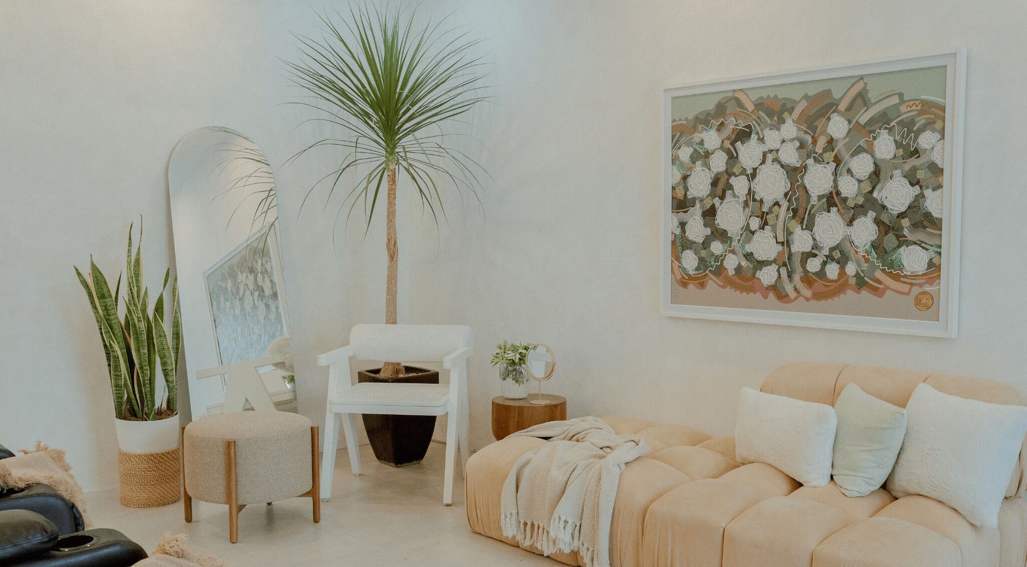 Peaceful lounge area at NEW Lounge La Union, Bacnotan, Ilocos Region, PH, featuring serene decor and plants.