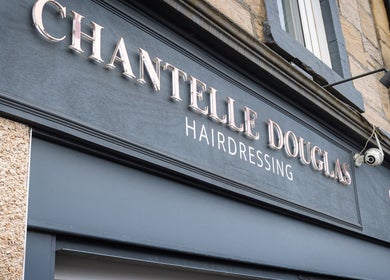 Chantelle Douglas Hairdressing salon entrance in Falkirk, Scotland, GB with stylish signage.