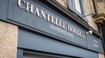 Chantelle Douglas Hairdressing salon entrance in Falkirk, Scotland, GB with stylish signage.