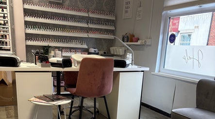 Relaxing nail station at Nails By Fiona King in Bedale, England, GB, featuring elegant decor and polish selection.