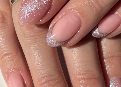 Elegant glitter nails from Nails By Fiona King in Bedale, England, GB, showcasing pink and shimmering designs.