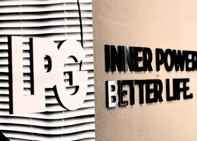Wall sign reading 'Inner Power Better Life' at Endermologie & Slimming, SOMERSET WEST, Western Cape, ZA.