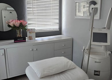 A tranquil treatment room at Endermologie & Slimming, SOMERSET WEST, Western Cape, ZA featuring modern equipment.
