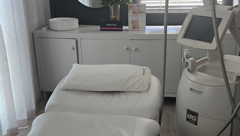 Relaxing treatment room at Endermologie & Slimming, SOMERSET WEST, Western Cape, ZA, featuring sleek modern equipment.