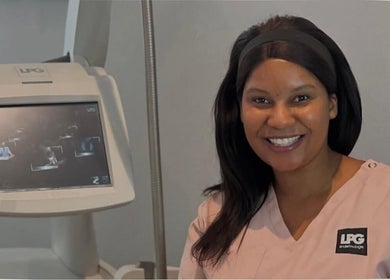Friendly therapist at Endermologie & Slimming, SOMERSET WEST, Western Cape, ZA, next to LPG machine.