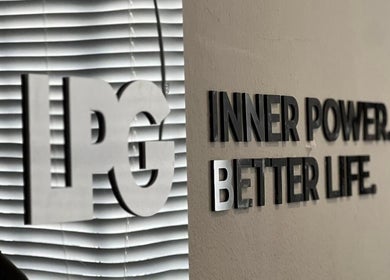 Wall sign at Endermologie & Slimming, SOMERSET WEST, Western Cape, ZA, with 'Inner Power. Better Life.' message.