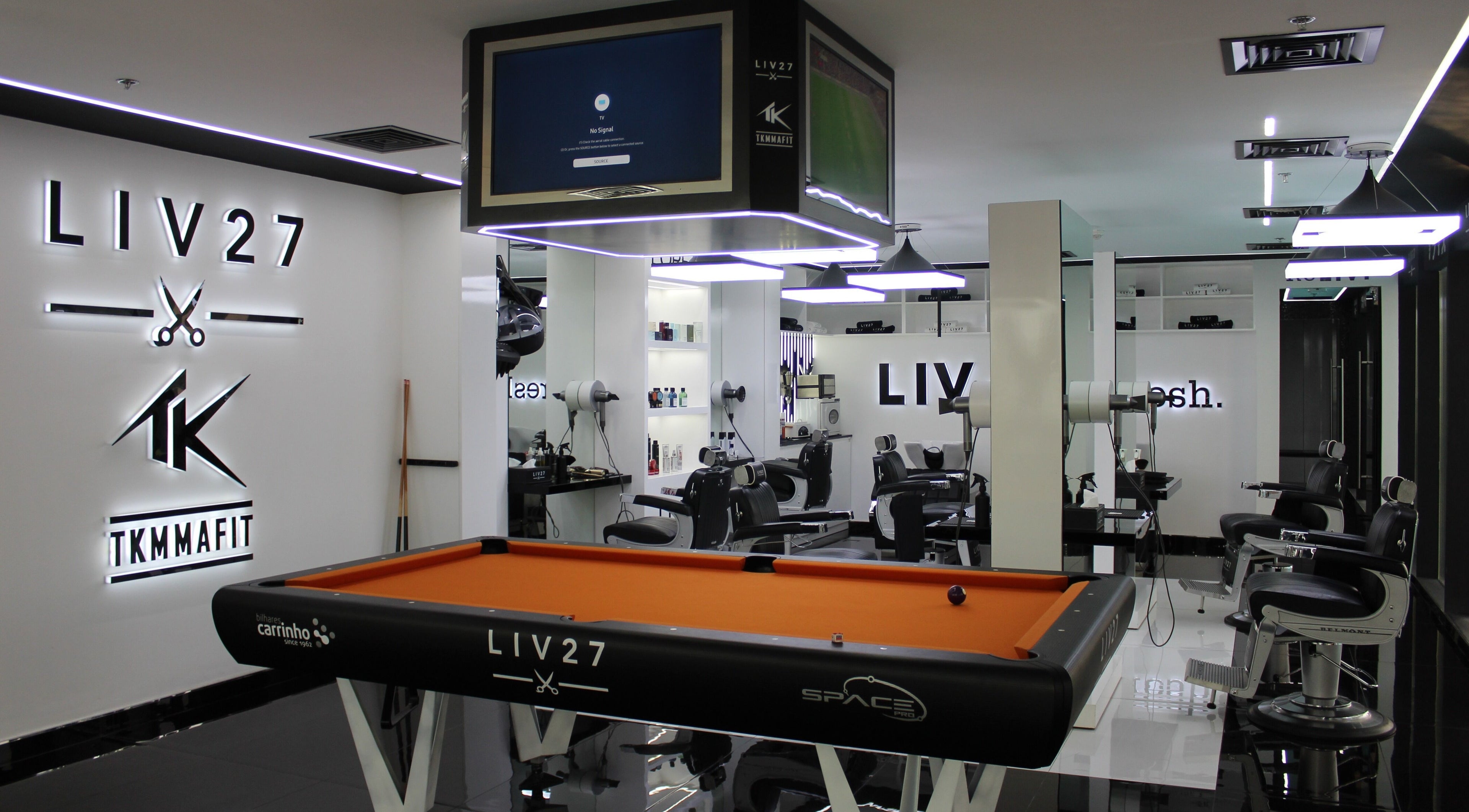 LIV27 - Media City Branch interior with sleek barber chairs and billiards in Dubai, Dubai, AE.