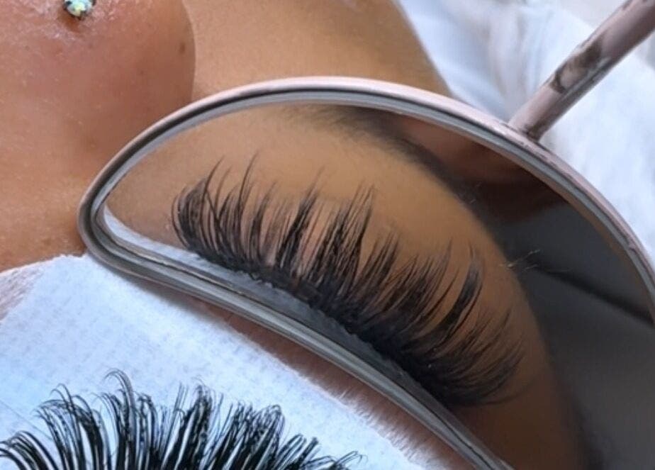 Close-up of eyelash extensions reflecting in a mirror at M Lash Studio, Springfield, Massachusetts, US.