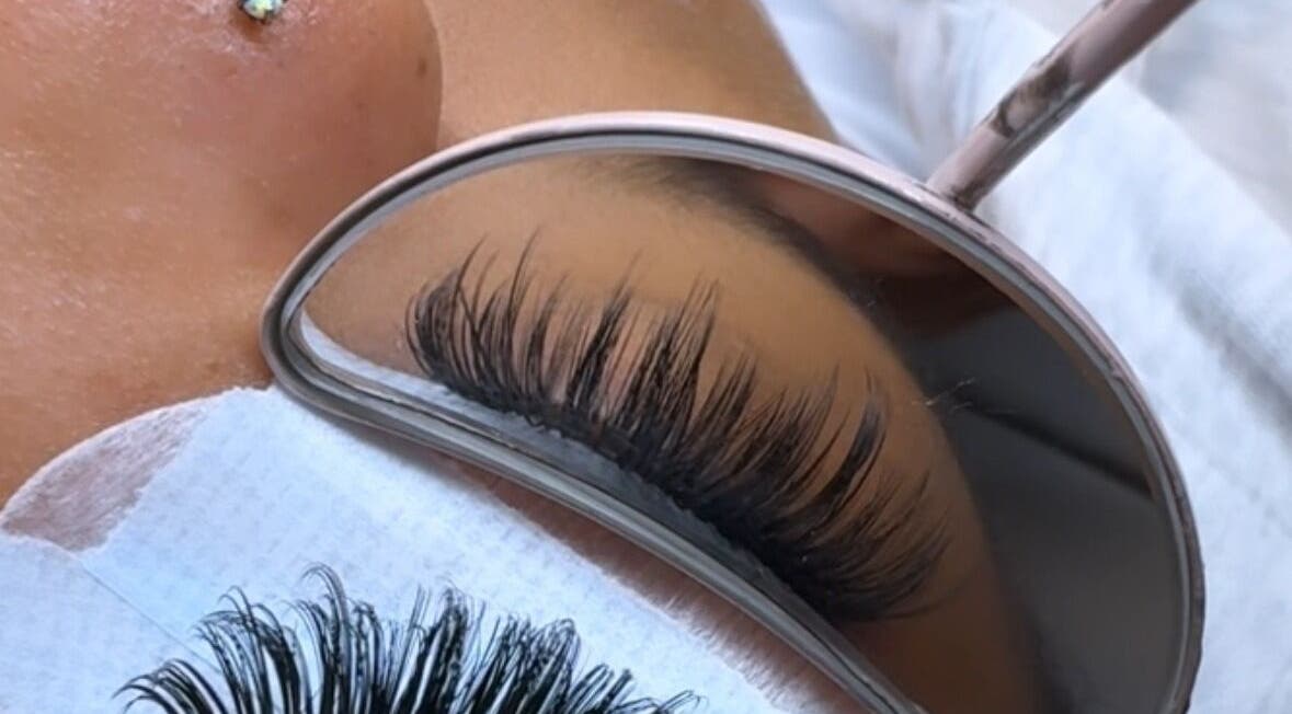 Close-up of eyelash extensions reflecting in a mirror at M Lash Studio, Springfield, Massachusetts, US.