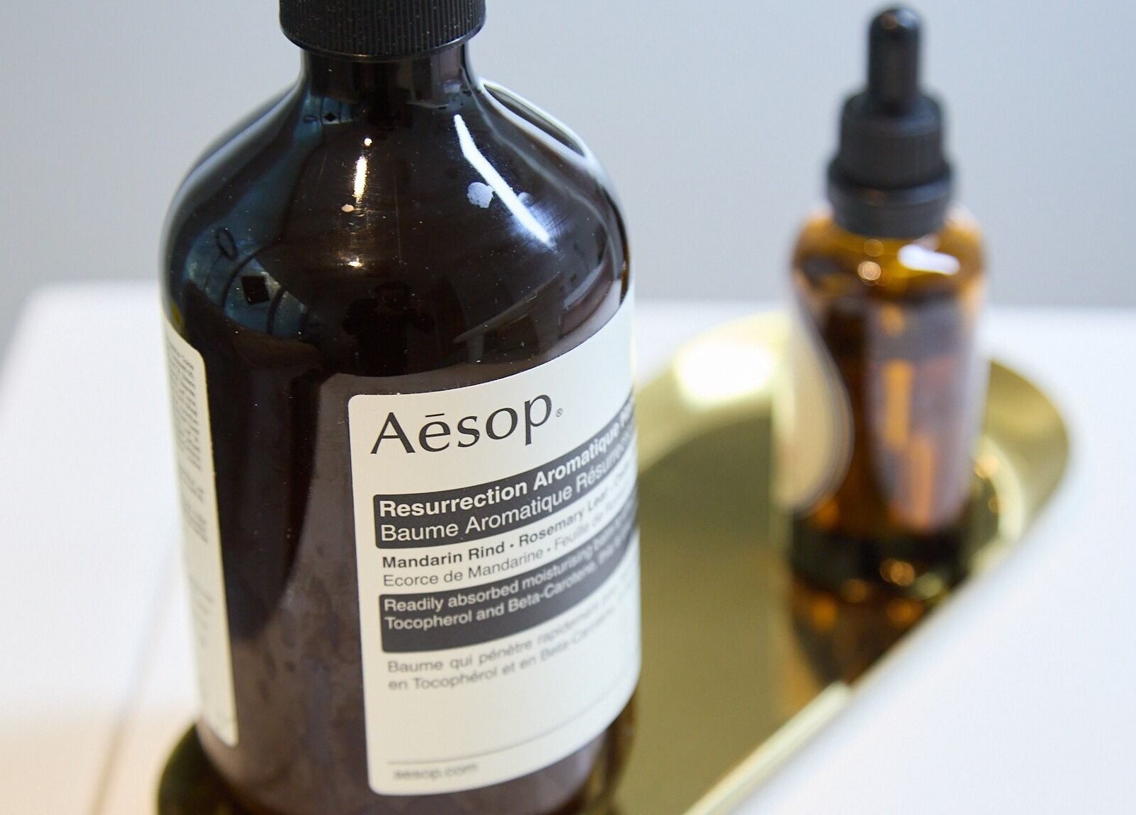 Aesop products on gold tray at Beauty by Kitty, St Leonards, New South Wales, AU, offering luxurious treatments.