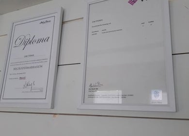 Diplomas displayed at The Beauty Garden, Bray, County Wicklow, IE, highlighting expertise in microdermabrasion.