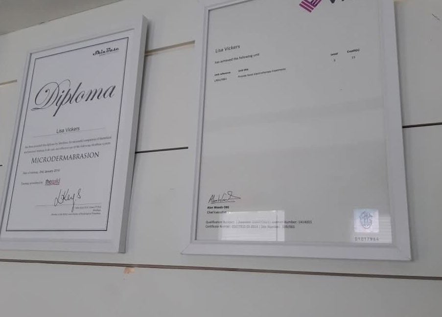Diplomas displayed at The Beauty Garden, Bray, County Wicklow, IE, highlighting expertise in microdermabrasion.