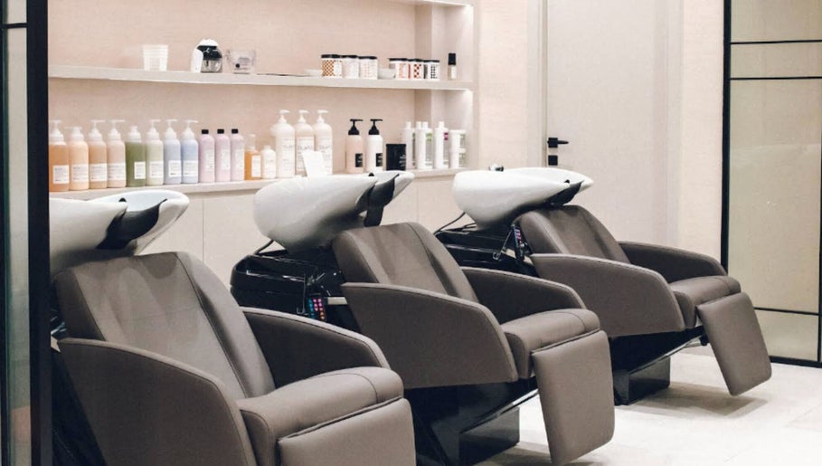 Luxurious shampoo stations at Hair Ltd. in الشارقة, إمارة الشارقةّ, AE showcasing modern salon design.