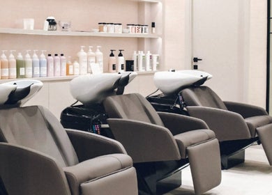 Luxurious shampoo stations at Hair Ltd. in الشارقة, إمارة الشارقةّ, AE showcasing modern salon design.