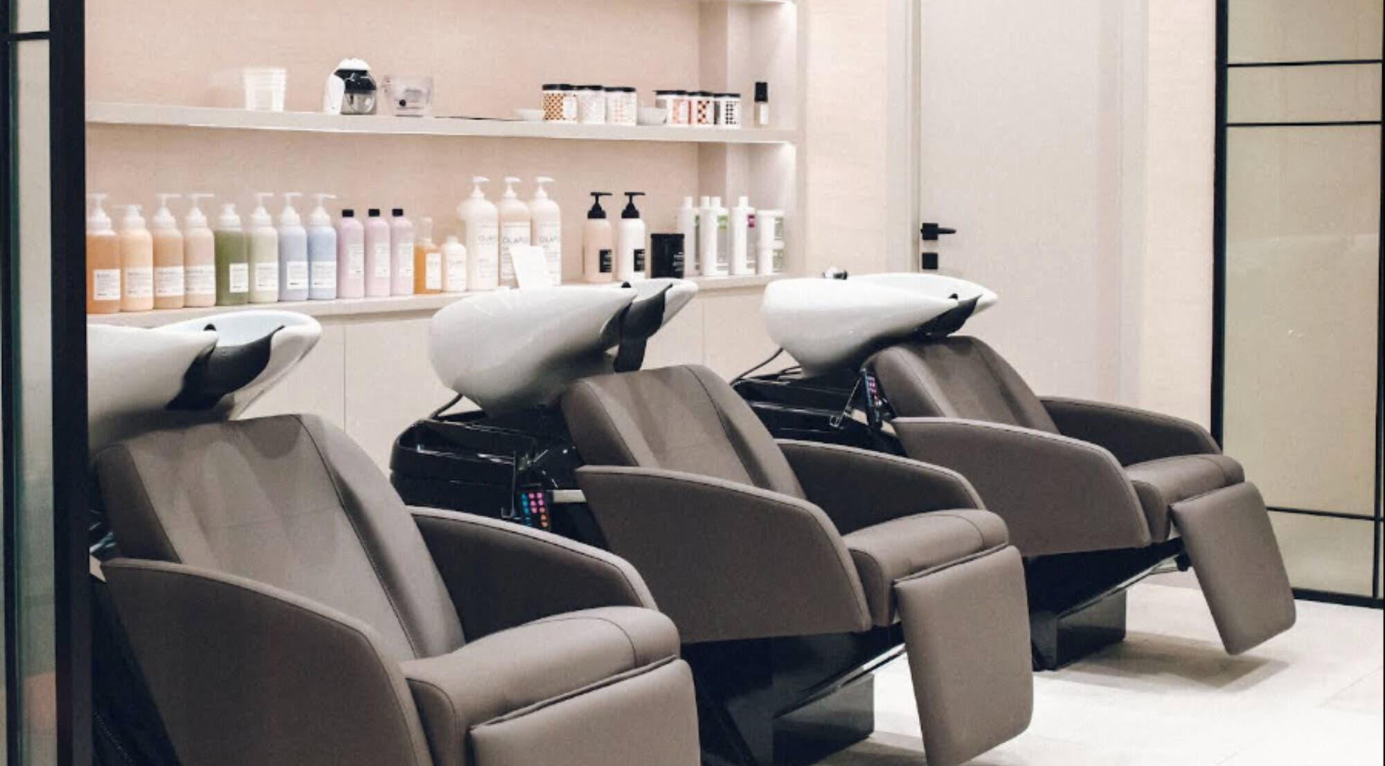 Luxurious shampoo stations at Hair Ltd. in الشارقة, إمارة الشارقةّ, AE showcasing modern salon design.