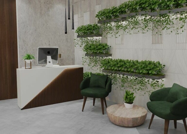 Modern reception with greenery at Dore Ladies Salon, Dubai, AE, showcasing elegant design and comfort.