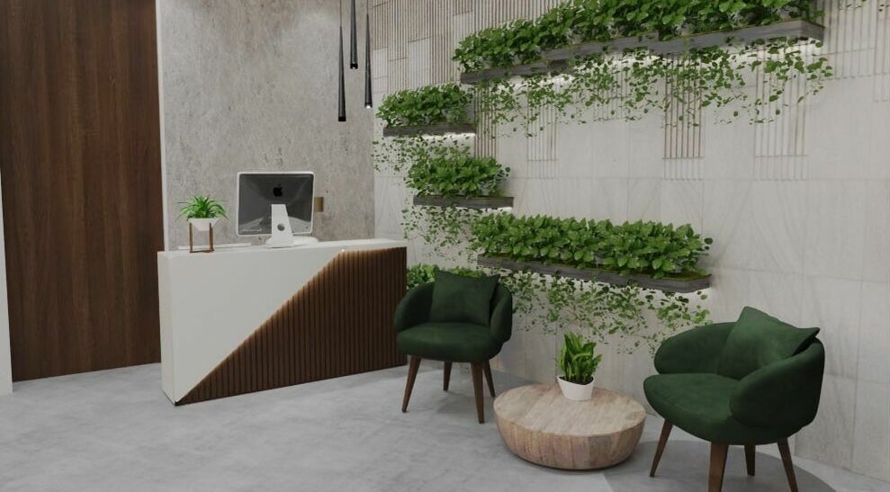 Modern reception with greenery at Dore Ladies Salon, Dubai, AE, showcasing elegant design and comfort.