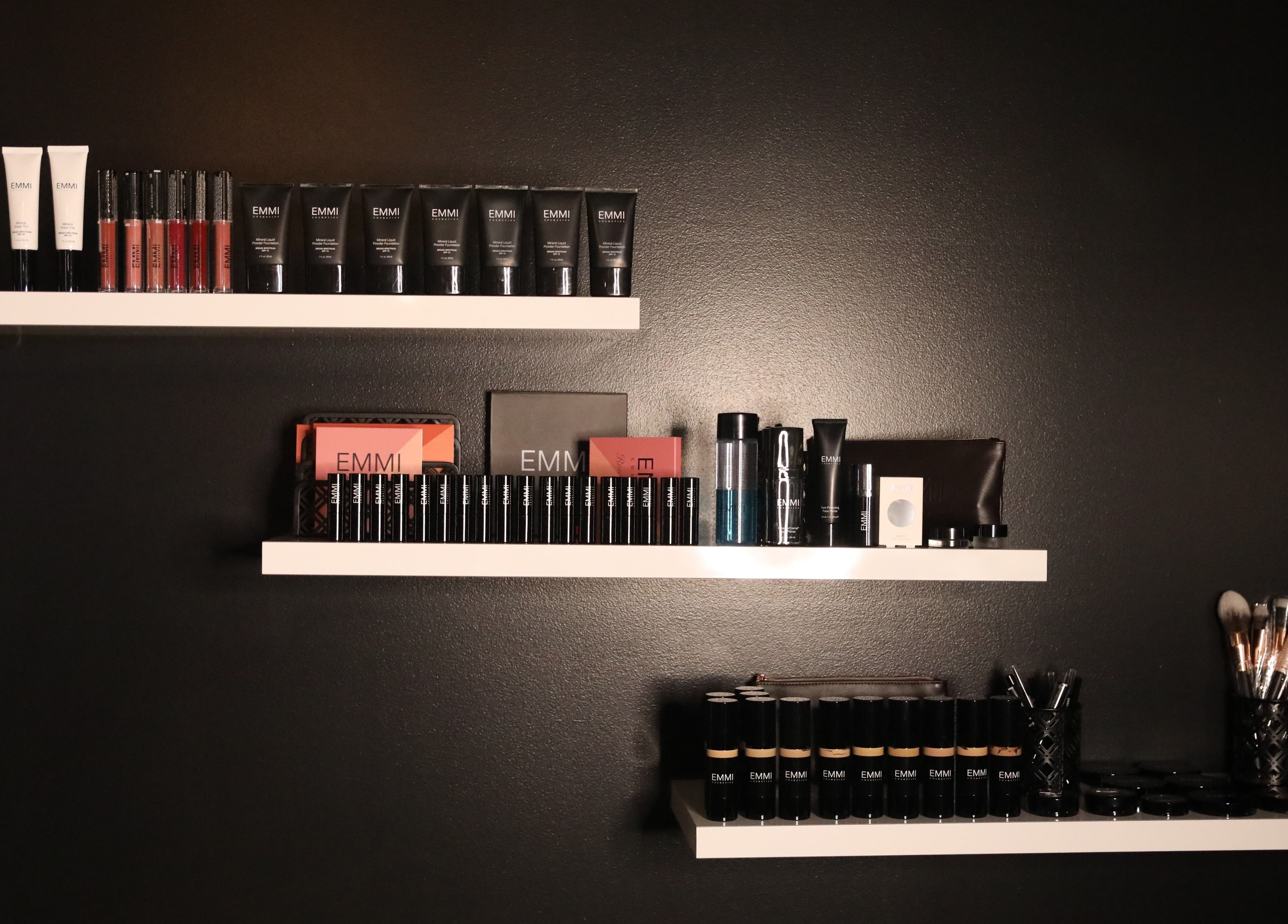 Sophisticated beauty products at Mojjatchi | Launceston, Launceston, TAS, AU. Sleek shelves with makeup essentials.