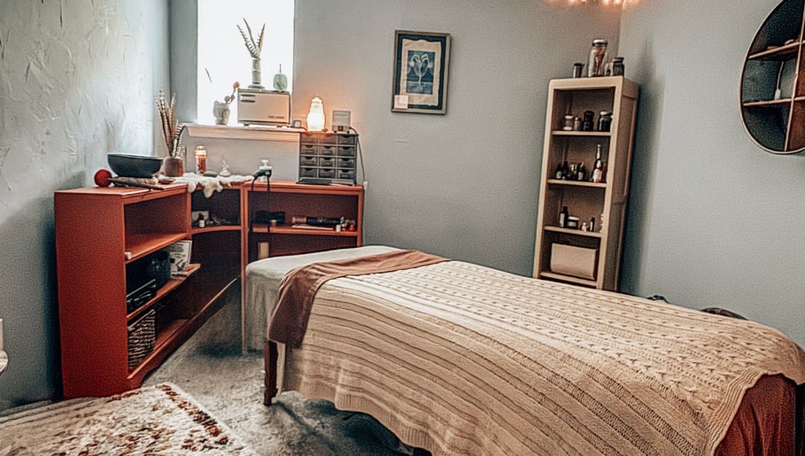 Cozy wellness room at Mama Flowers, Kutztown, Pennsylvania, US with massage table and ambient lighting.