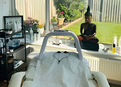Treatment room at Finishing Touches Skin & Beauty, York, England, GB, with a spa bed and calming decor.