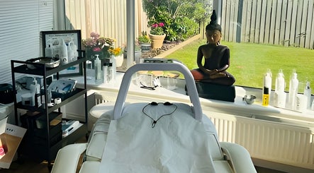 Treatment room at Finishing Touches Skin & Beauty, York, England, GB, with a spa bed and calming decor.
