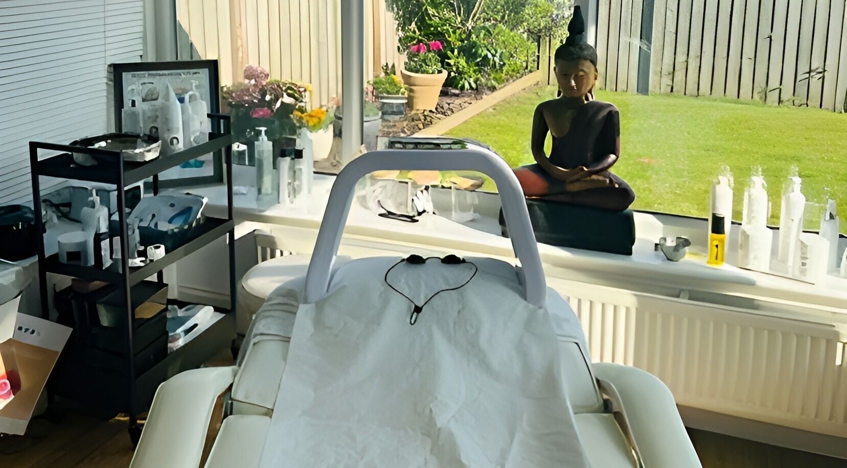 Relaxing treatment room at Finishing Touches Skin & Beauty, York, England, GB, with skincare products and decor.