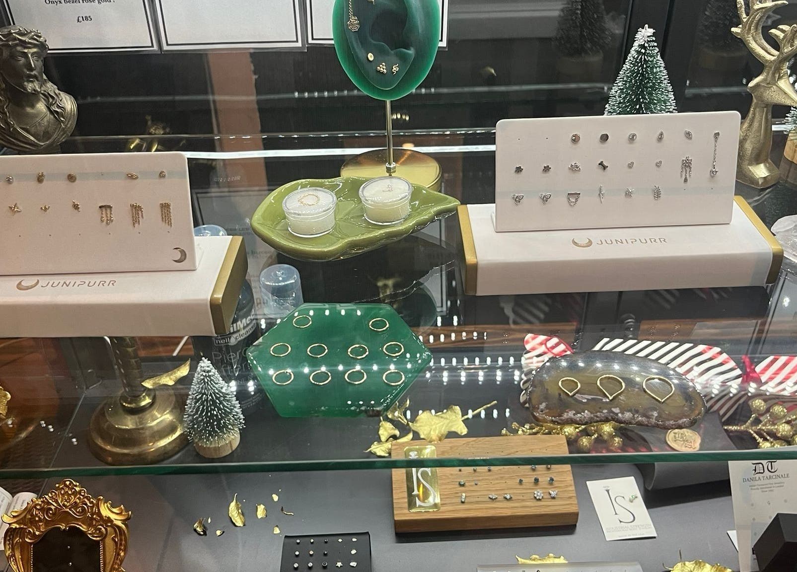 Elegant jewelry display at Black Abbey Tattoo and Piercing, Glasgow, Scotland, GB with unique ornate designs.