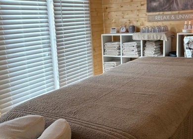 Relaxing therapy room at Rio Bluebell Therapies, Salisbury, England, GB, featuring a cozy massage table.