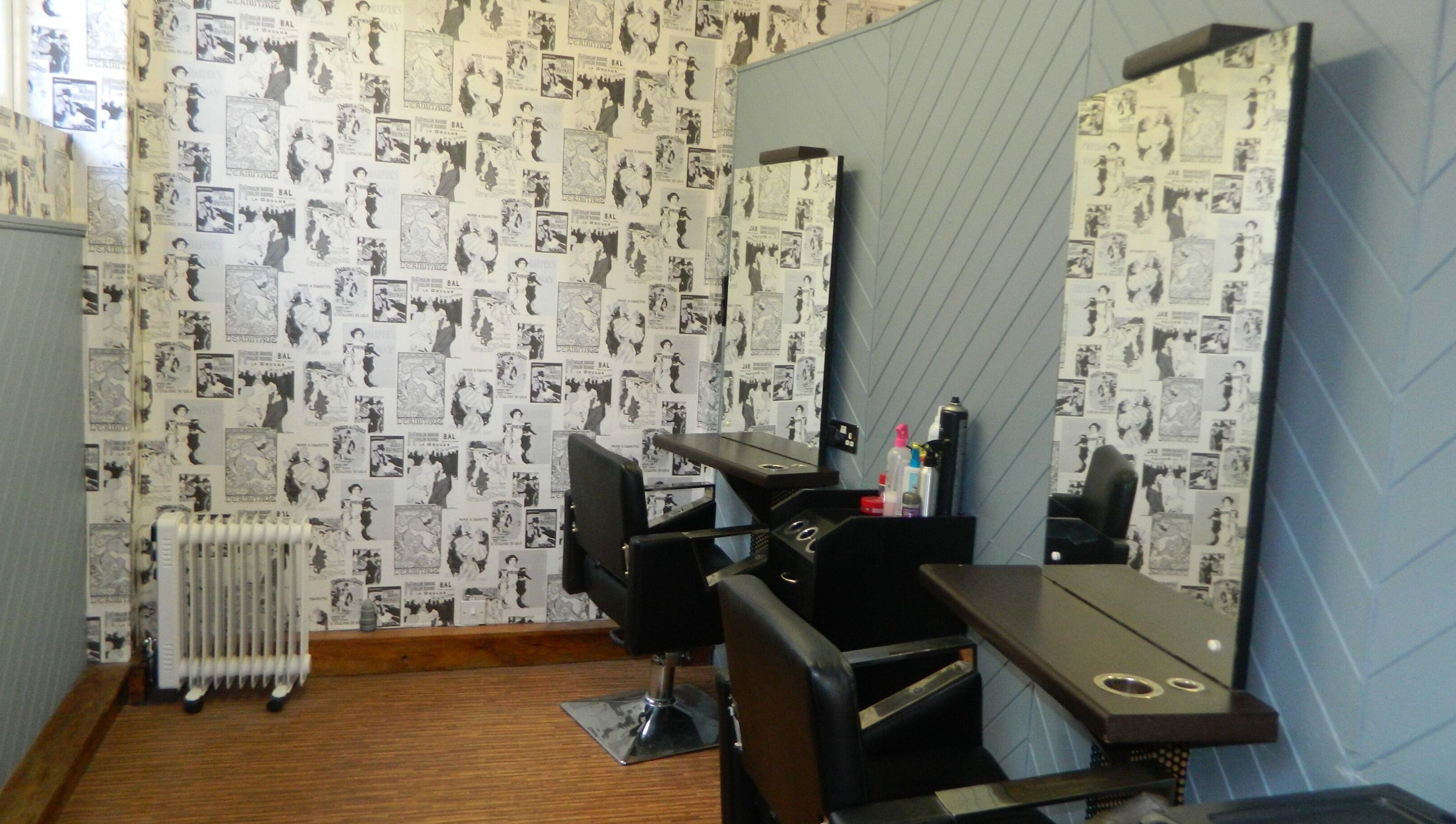 Stylish hairdressing area at Aquaintance Hair Salon, Darlington, England, GB with retro-themed decor.