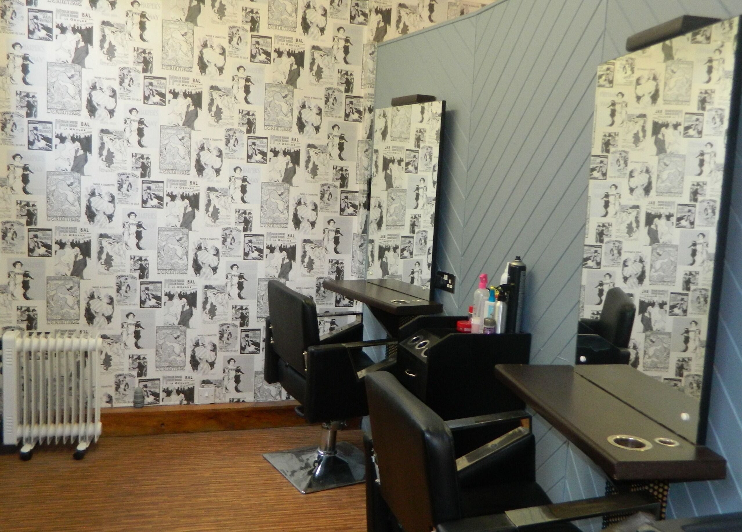 Stylish hairdressing area at Aquaintance Hair Salon, Darlington, England, GB with retro-themed decor.