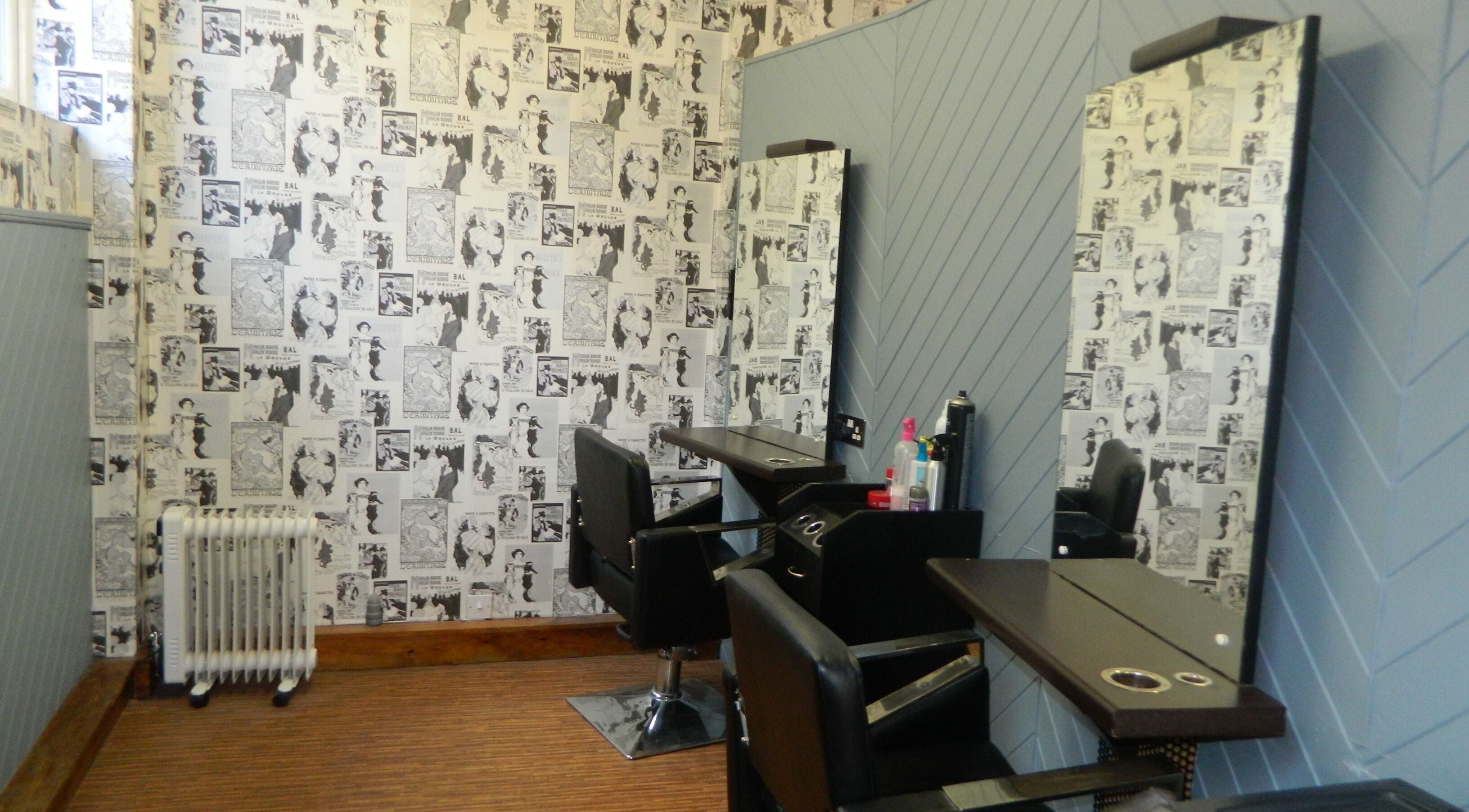 Stylish hairdressing area at Aquaintance Hair Salon, Darlington, England, GB with retro-themed decor.