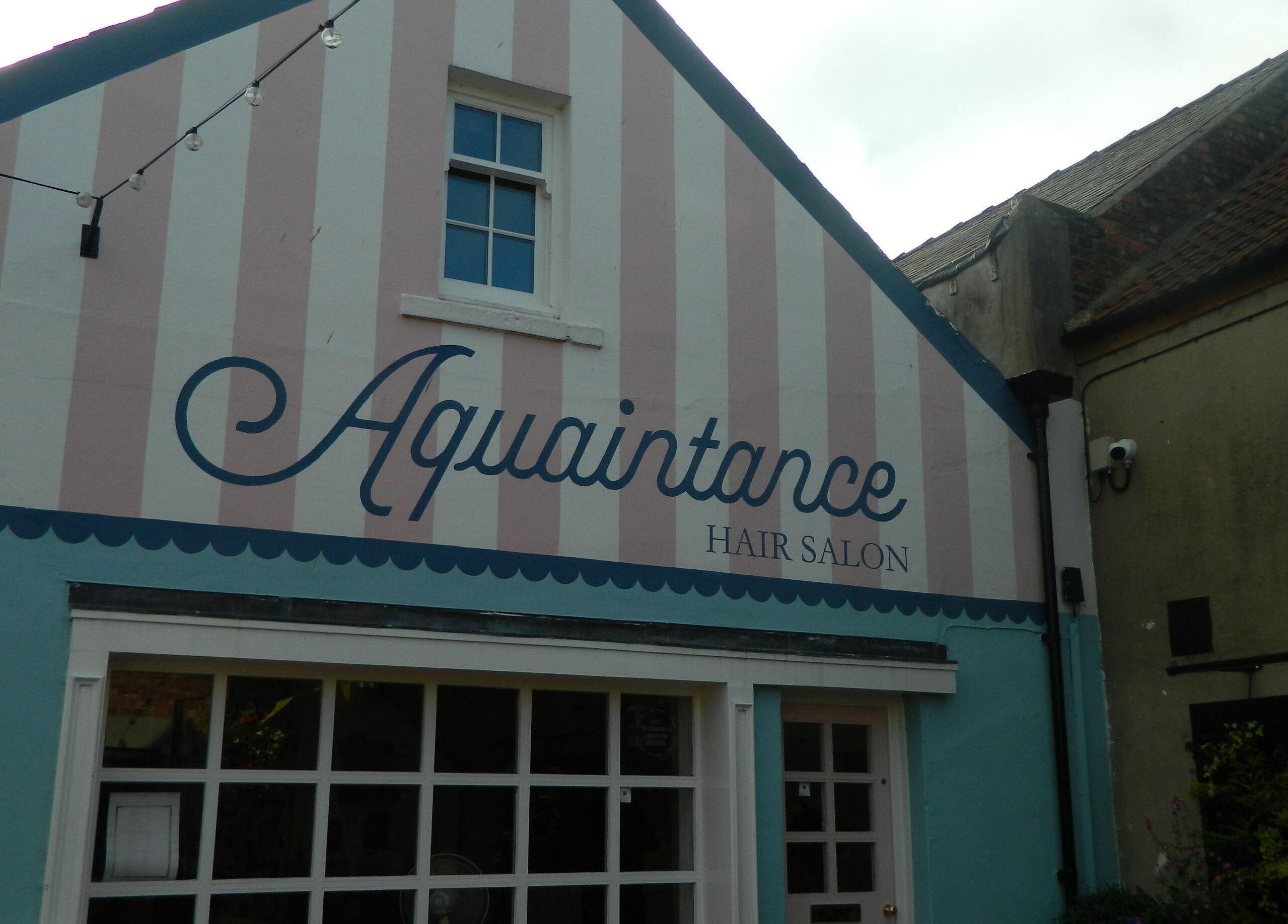 Front view of Aquaintance Hair Salon in Darlington, England, GB, showcasing its inviting exterior.