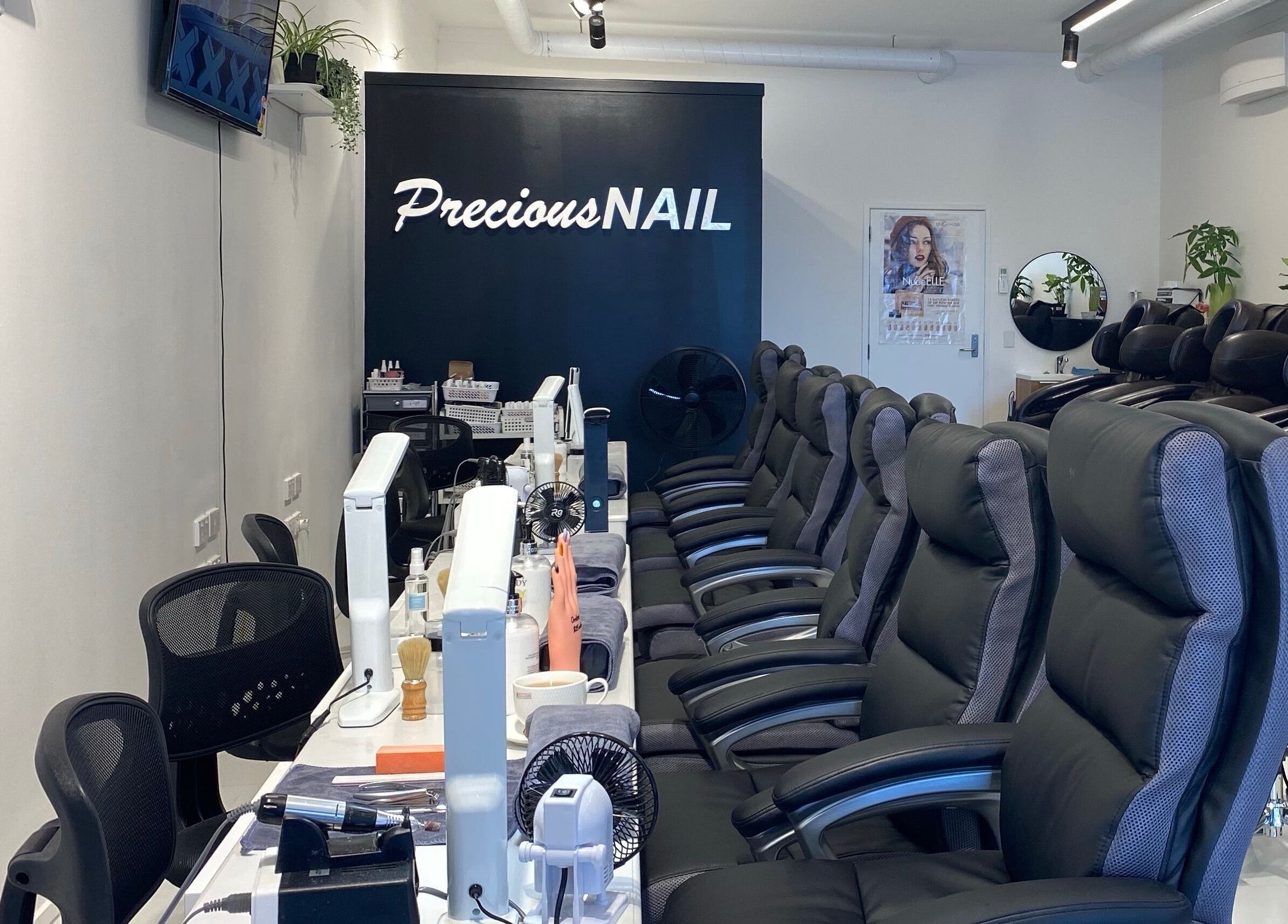 Interior view of Precious Nail, Auckland, NZ showing elegant nail care seating and tools.