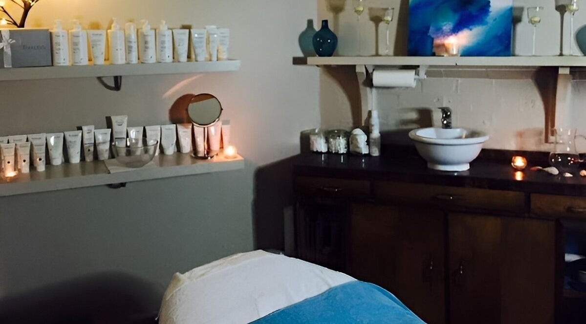 Cozy spa room at First Class Beauty, Melbourne, Victoria, AU with elegant decor and beauty products.
