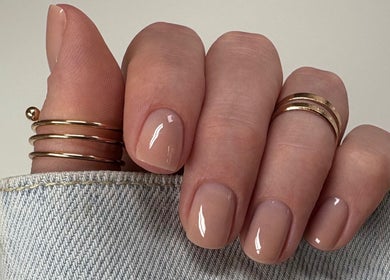 Elegant nude manicure at Nails by Sonya Stark, Leeds, England, GB. Perfect for a chic, polished look.